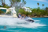 Jet Ski Passing Waterfront Homes