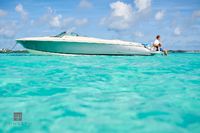 Small Boat in Turquoise Water