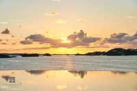 Sunlight Across a Coastal Pool
