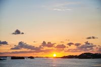 Sunset Over Calm Water