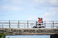 Scooter Crossing a Bermuda Bridge