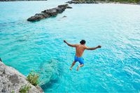 Cliff Jump into Turquoise Water