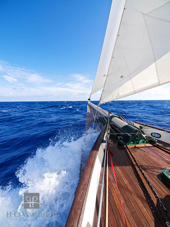 Pushing North through the Atlantic under full sail with the blue skies and deep blue sea