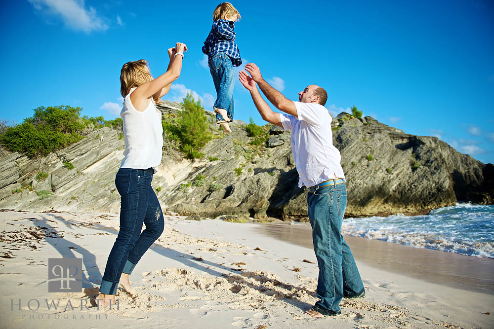 Mother and Father playing with their young son