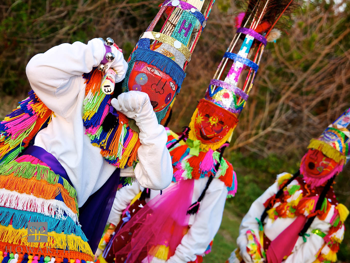 The colourful costumes and masks worn by the Gombey Dancers while performing