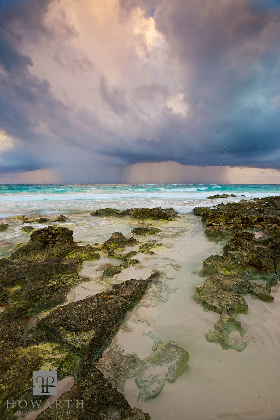 A summer squall comes ashore at Grape Bay