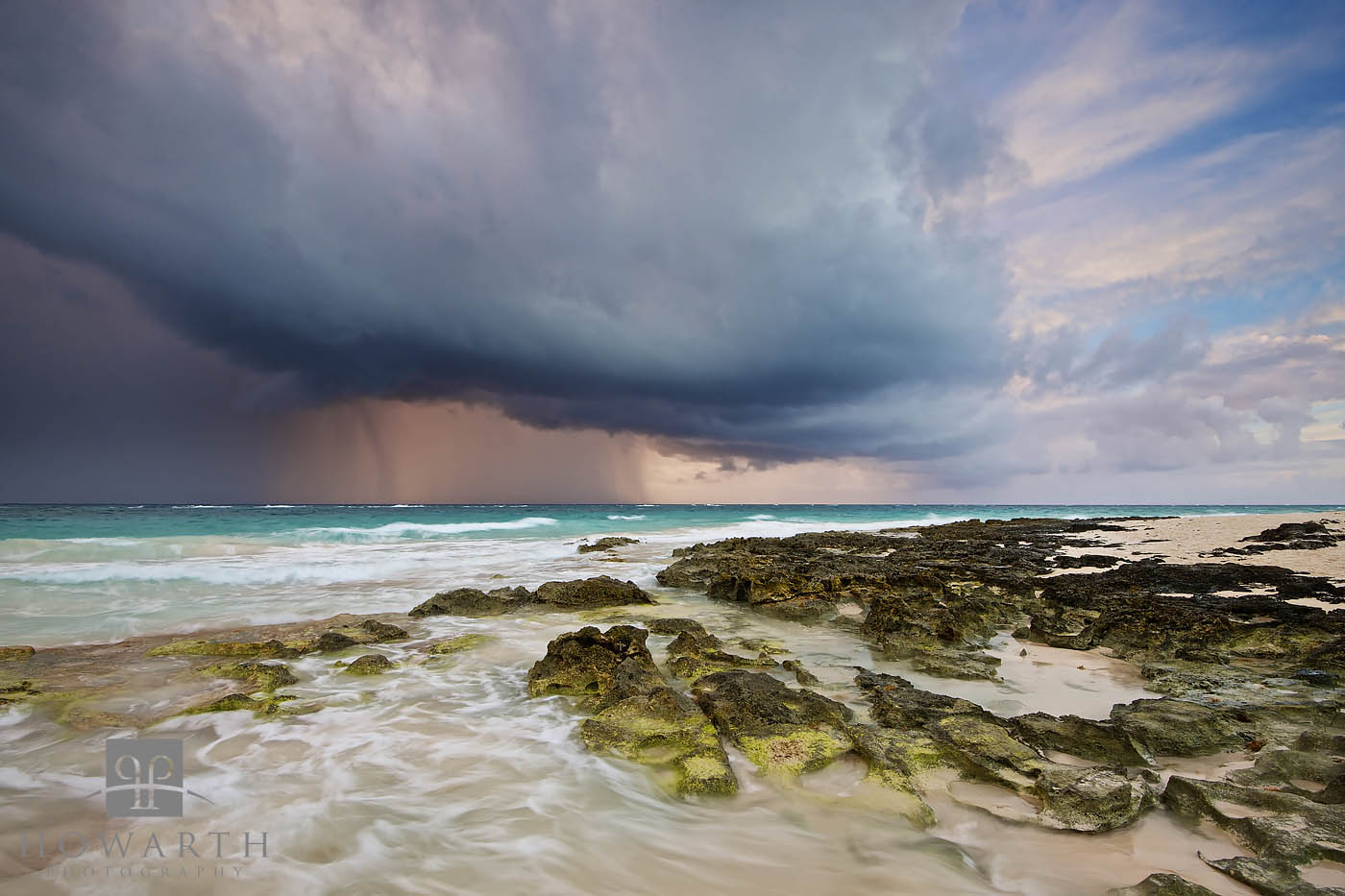 A summer squall comes ashore at Grape Bay