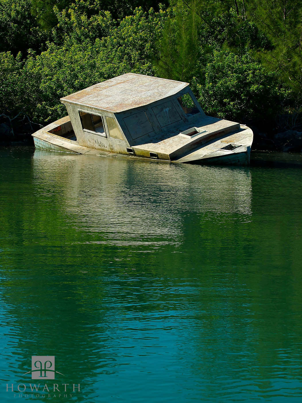 An old fishing boat wrecked in the mangroves