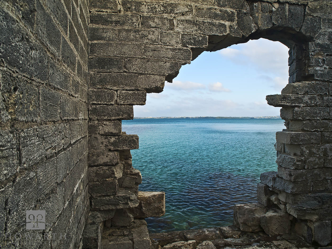 A hole in the wall at an old ruin at the tiny Hospital Island