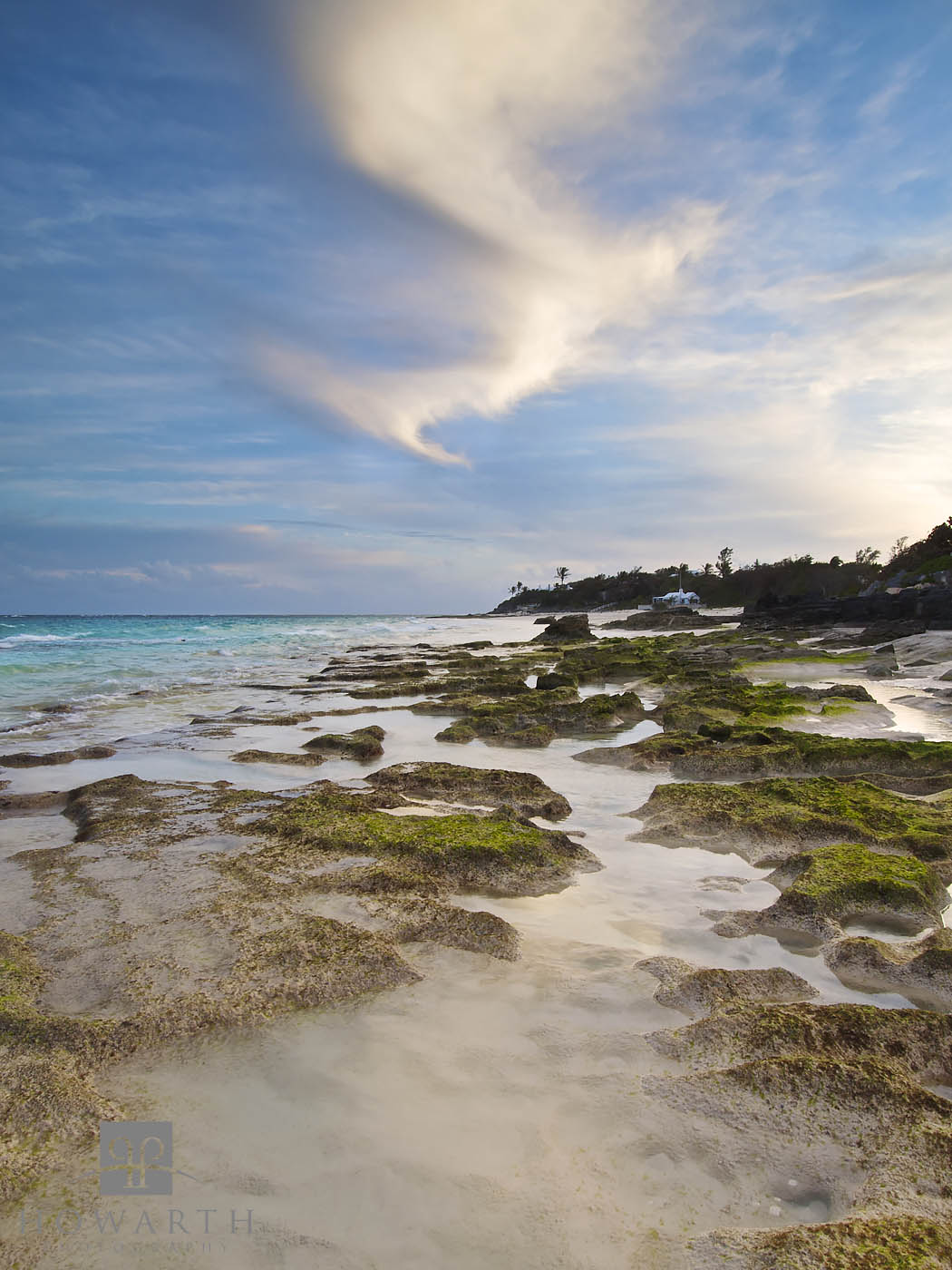 A unique cloud formation over the rocky Grape bay