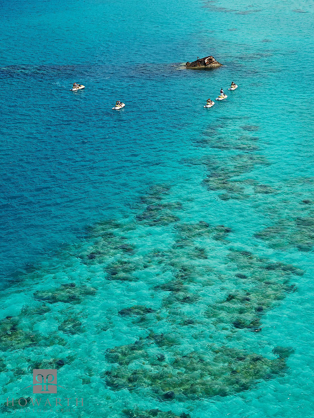 A Jet Ski tour feeding the fish at the wreck of the Vixen