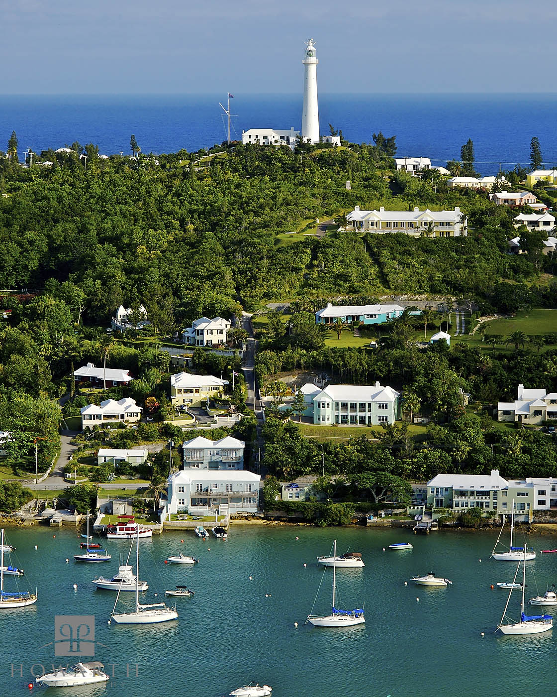 The sheltered bay with the Gibbs Hill Lighthouse and Southshore in the background