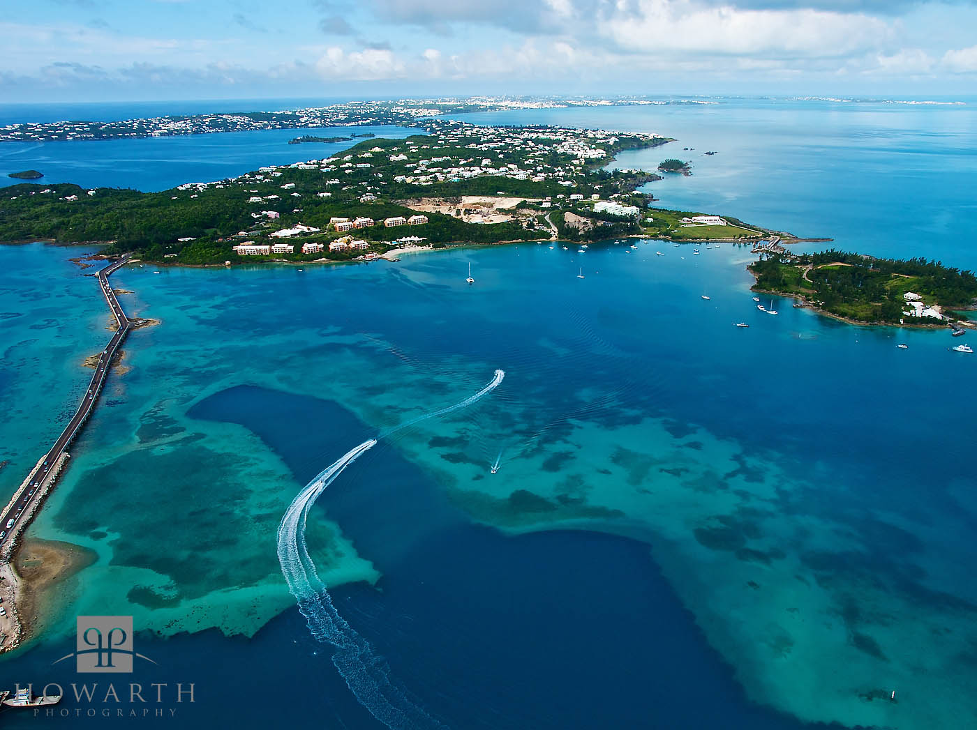 The Northern end of Castle Harbour with the Causeway and Grotto Bay Hotel shown