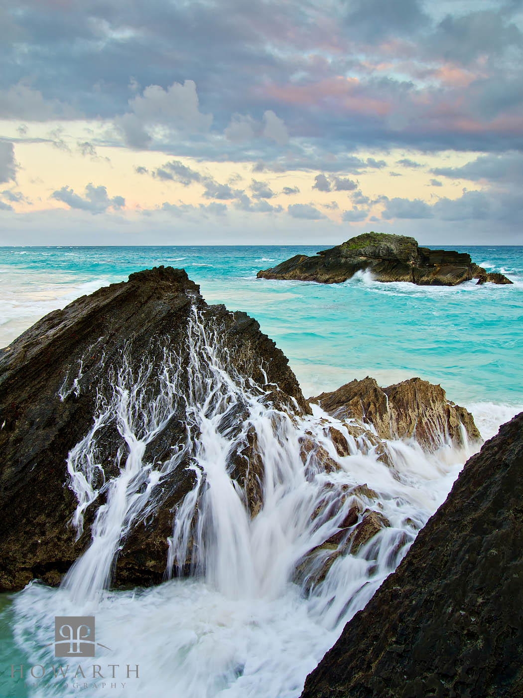 Water runs down after a large wave crashes ashore